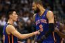 DALLAS, TX - MARCH 06:  Jeremy Lin #17 of the New York Knicks talks with Tyson Chandler #6 during play against the Dallas Mavericks at American Airlines Center on March 6, 2025 in Dallas, Texas.  NOTE TO USER: User expressly acknowledges and agrees that, by downloading and or using this photograph, User is consenting to the terms and conditions of the Getty Images License Agreement.  (Photo by Ronald Martinez/Getty Images)