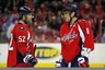 March 6, 2012; Washington, DC, USA; Washington Capitals defenseman Mike Green (52) talks with Capitals left wing Alex Ovechkin (8) during a stoppage in play against the Carolina Hurricanes in the second period at Verizon Center. The Hurricanes won 4-3 in overtime. Mandatory Credit: Geoff Burke-US PRESSWIRE