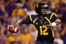 BATON ROUGE LA - SEPTEMBER 25:  Quarterback Geno Smith #12 of the West Virginia Mountaineers looks to throw a pass against the Louisiana State University Tigers at Tiger Stadium on September 25 2010 in Baton Rouge Louisiana.  (Photo by Chris Graythen/Getty Images)
